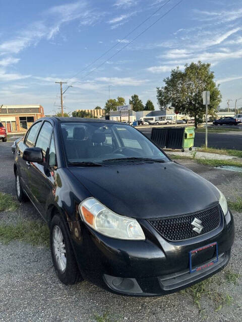 suzuki sx4 sedan 2013 JS2YC5A31D6100942 image suzuki sx4 sedan 2013 JS2YC5A31D6100942 image